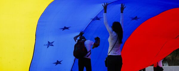 مظاهرات المعارضة الفنزويلية (خوان غوايدو) في كاراكاس، فنزويلا فبراير/ شباط 2019 - سبوتنيك عربي