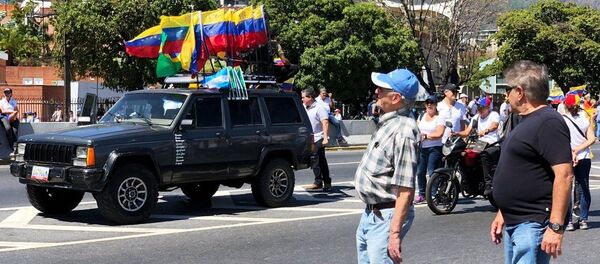 مظاهرات المعارضة الفنزويلية (خوان غوايدو) في كاراكاس، فنزويلا فبراير/ شباط 2019 - سبوتنيك عربي