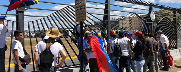 مظاهرات المعارضة الفنزويلية في كاراكاس، فنزويلا فبراير/ شباط 2019 - سبوتنيك عربي