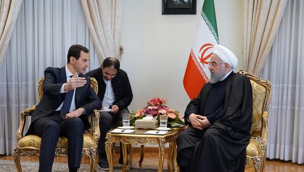الرئيس الإيراني يستقبل الرئيس السوري بشار الأسد في طهران - سبوتنيك عربي