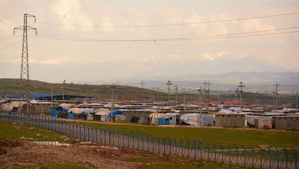 اللاجئون السوريون والعراقيون في مخيم للاجئين/ النازحين بالقرب من السليمانية، كردستان العراق اللاجئون السوريون والعراقيون في مخيم للاجئين/ النازحين بالقرب من السليمانية، كردستان العراق - سبوتنيك عربي