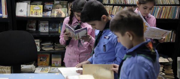 دمشق التبادلية: ضع كتاب وخذ آخر...100 ألف كتاب في أضخم مكتبة مدرسية عربية - سبوتنيك عربي