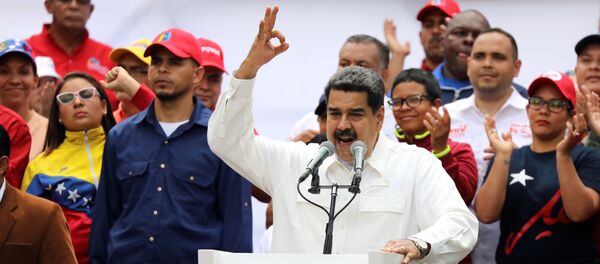 الرئيس الفنزويلي نيكولاس مادورو يخطب في حشد مؤيد له في كاراكاس الرئيس الفنزويلي نيكولاس مادورو يخطب في حشد مؤيد له في كاراكاس - سبوتنيك عربي