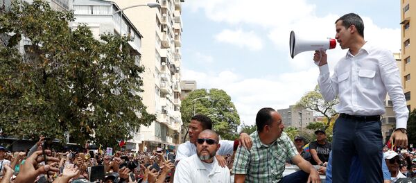 زعيم المعارضة الفنزويلية خوان غوايدو يشارك في مظاهرة حاشد ضد مادورو - سبوتنيك عربي