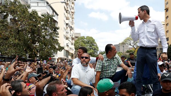زعيم المعارضة الفنزويلية خوان غوايدو يشارك في مظاهرة حاشد ضد مادورو - سبوتنيك عربي