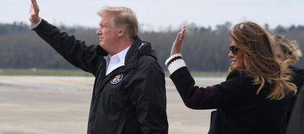 ميلانيا ترامب مع زوجها الرئيس الأمريكي دونالد ترامب، 8 مارس/آذار 2019 - سبوتنيك عربي