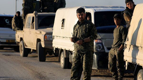 مقاتلون من قوات سوريا الديمقراطية في الباغوز بسوريا - سبوتنيك عربي