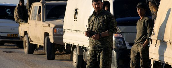 مقاتلون من قوات سوريا الديمقراطية في الباغوز بسوريا - سبوتنيك عربي