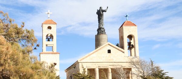 أكبر تمثال للسيد المسيح في العالم العربي يعتلي أعلى قمم القلمون شمال دمشق - سبوتنيك عربي