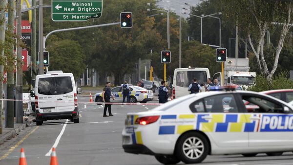 Police block the road near the shooting at a mosque in Linwood, Christchurch, New Zealand, Friday - سبوتنيك عربي