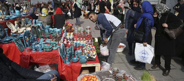 استعدادات بالاحتفال ببعيد النوروز في إيران، 13 مارس/ آذار 2019 - سبوتنيك عربي