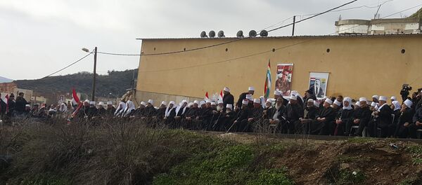 أهالي الجولان المحتل يتظاهرون رفضا لمحاولات الاستيلاء عليه - سبوتنيك عربي