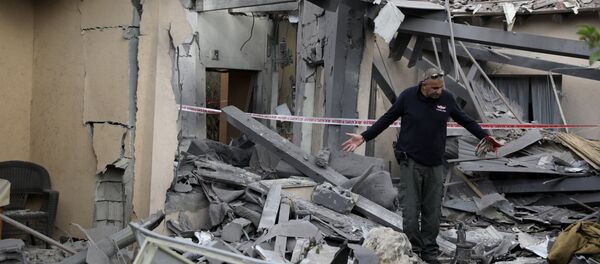 موقع سقوط الصاروخ على مستوطنة بالقرب من تل أبيب في وسط إسرائيل موقع سقوط الصاروخ على مستوطنة بالقرب من تل أبيب في وسط إسرائيل - سبوتنيك عربي