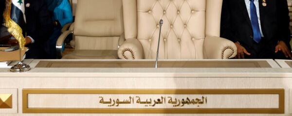 مقعد سوريا فارغا خلال القمة العربية الثلاثين في تونس - سبوتنيك عربي