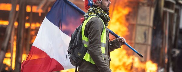 مشارك في تظارهات السترات الصفراء في باريس، مارس/ آذار 2019 مشارك في تظارهات السترات الصفراء في باريس، مارس/ آذار 2019 - سبوتنيك عربي