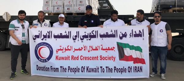 مساعدات إنسانية من الكويت لضحايا الفيضانات في إيران - سبوتنيك عربي