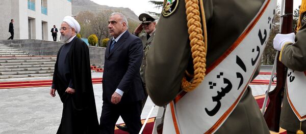 رئيس الحكومة العراقية، عادل عبد المهدي مع الرئيس الإيراني حسن روحاني - سبوتنيك عربي