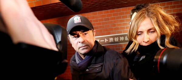 كارول غصن مع زوجها كارلوس غصن - سبوتنيك عربي