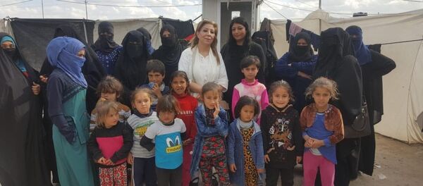 ندى الجبوري في محيم الأرامل والمطلقات بالعراق - سبوتنيك عربي