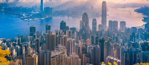 صورة فوتوغرافية بعنوان هونغ كونغ: المدينة الذهبية (Hong Kong: The Golden City)، للمصور تران مينه دانغ، الحائزة على المرتبة الثانية في فئة التصوير صورة تعبير إنشاء (Photo Essay) - سبوتنيك عربي