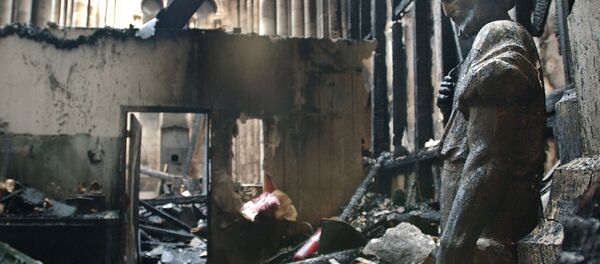 اشتعال حريق هائل في كاتدرائية يوحنا المعمدان في نيويورك، 19 ديسمبر/ كانون الأول 2001 - سبوتنيك عربي