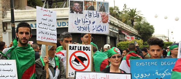 احتجاجات الجزائر في الجمعة التاسعة احتجاجات الجزائر في الجمعة التاسعة - سبوتنيك عربي