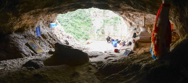 افتتاح كهف بايشيا كارست حيث تم اكتشاف عظم أحفوري لعضو منقرض من شجرة العائلة البشرية يدعى دينيسوفان  - سبوتنيك عربي