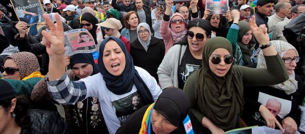 المرأة المغربية تشارك في مسيرة تضامن مع القادة المسجونين في منطقة الريف - سبوتنيك عربي