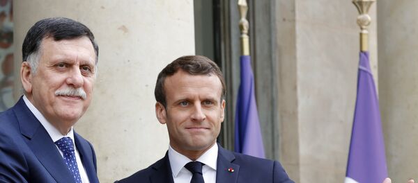 السراج مع ماكرون في باريس - سبوتنيك عربي