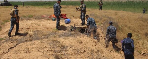 تدمير مخابئ احتوت مواد خطرة لـداعش في العراق  - سبوتنيك عربي