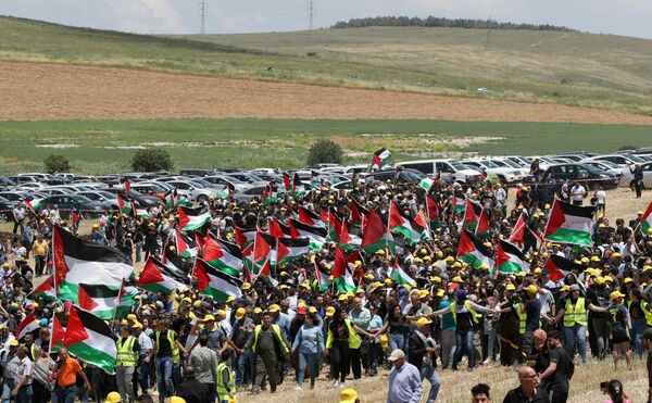 فلسطنيون يشاركون في مسيرة بمناسبة النكبة شمال إسرائيل - سبوتنيك عربي