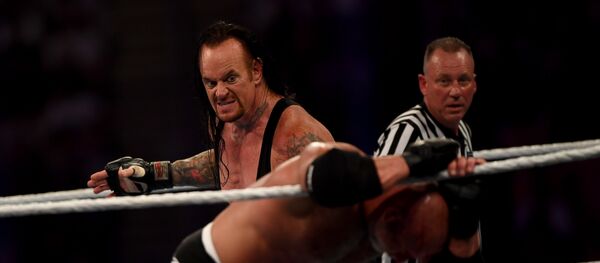 مبارة أندرتيكر وغولدبرغ في مهرجان سوبر شوداون في جدة بالمملكة العربية السعودية، 7 يونيو/حزيران 2019 - سبوتنيك عربي