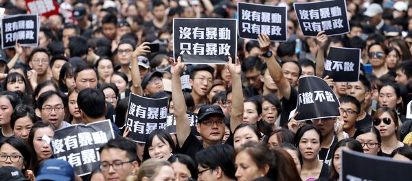 احتجاجات في هونغ كونغ ضد قانون تسليم المطلوبين إلى الصين، 16 يونيو/حزيران 2019 - سبوتنيك عربي