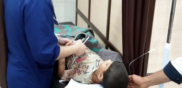طفل مصاب في هجوم حلب - سبوتنيك عربي