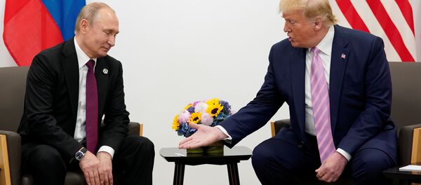 فلاديمير بوتين ودونالد ترامب في قمة العشرين باليابان - سبوتنيك عربي