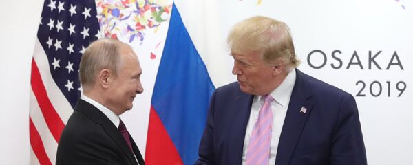 فلاديمير بوتين ودونالد ترامب في قمة العشرين في اليابان  - سبوتنيك عربي