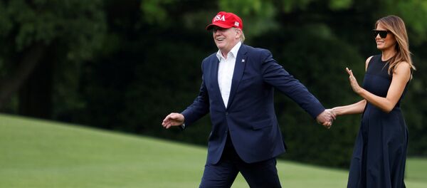 ترامب وزوجته ميلانيا - سبوتنيك عربي