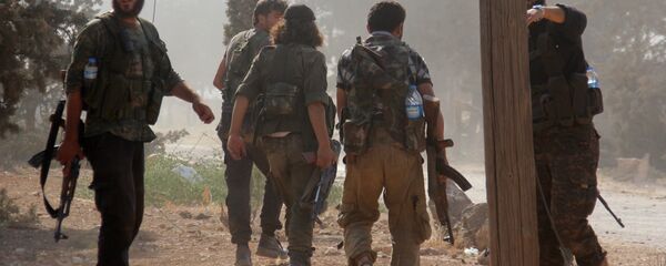 مقاتلين من تنظيم جبهة النصرة الإرهابي في الشمال السوري - سبوتنيك عربي