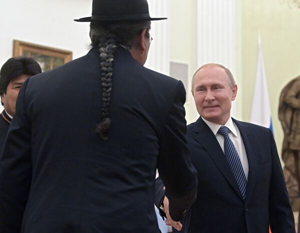 الرئيس الروسي فلاديمير بوتين خلال لقائه مع الرئيس البوليفي إيفو موراليس - سبوتنيك عربي