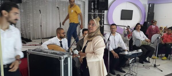 إيمان جنيدي إيمان جنيدي أول سيدة من صعيد مصر تقود فرقة موسيقية خاصة - سبوتنيك عربي