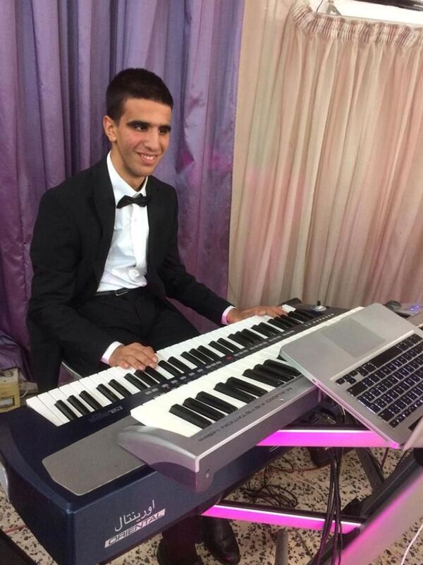 أسامة قصارة عازف أورغ تونسي ضرير تحدى إعاقته بالفن - سبوتنيك عربي