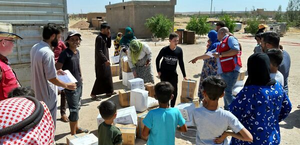 لأول مرة منذ 8 سنوات... إغاثة الهلال الأحمر السوري تصل إلى مركدة في ريف الحسكة - سبوتنيك عربي