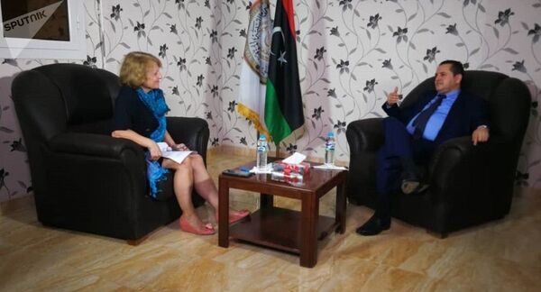 وزير خارجية الحكومة الليبية المؤقتة يتحدث لـسبوتنيك عن عملية طرابلس والحل السياسي - سبوتنيك عربي