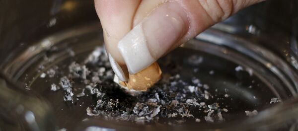 إطفاء سيجارة إطفاء سيجارة - سبوتنيك عربي