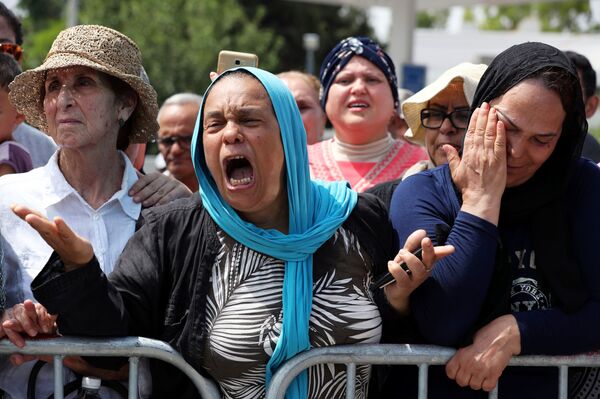 بالصور.. تونس تبكي السبسي أول رئيس باقتراع عمومي بعد ربيعها - سبوتنيك عربي