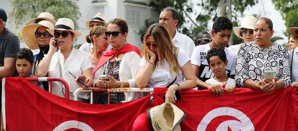 رد فعل النساء خلال تشييع الرئيس التونسي الباجي قائد السبسي في تونس رد فعل النساء خلال تشييع الرئيس التونسي الباجي قائد السبسي في تونس - سبوتنيك عربي