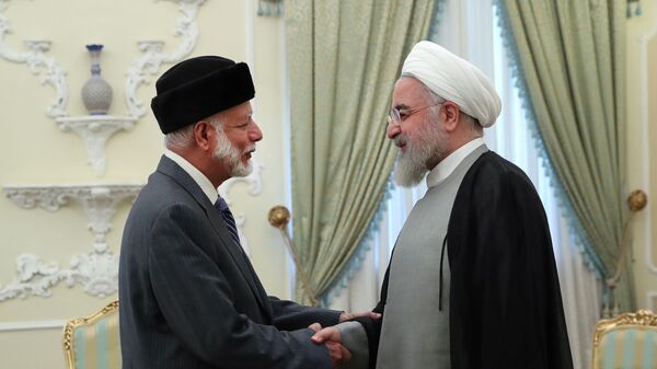 الرئيس الإيراني حسن روحاني يستقبل وزير خارجية سلطنة عمان يوسف بن علوي - سبوتنيك عربي