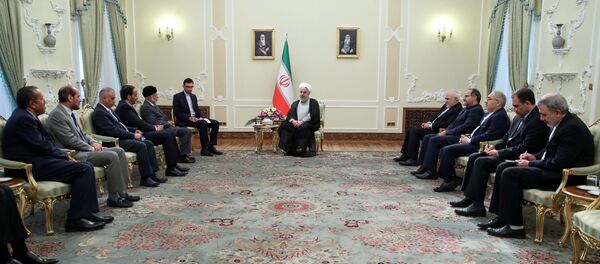 الرئيس الإيراني حسن روحاني يستقبل وزير خارجية سلطنة عمان يوسف بن علوي في طهران - سبوتنيك عربي