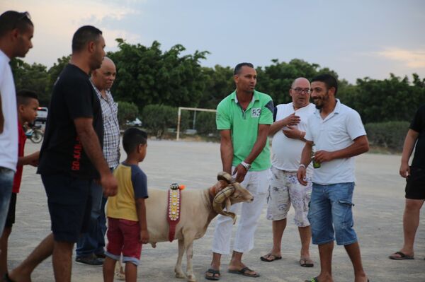تحجيج الخراف والحية بية وبو جلود... أغرب عادات عيد الأضحية في بعض الدول - سبوتنيك عربي