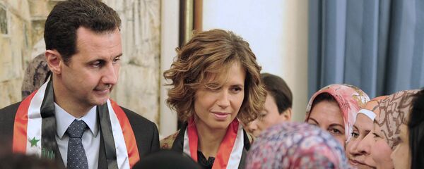 أسماء الأسد مع زوجها الرئيس السوري بشار الأسد - سبوتنيك عربي